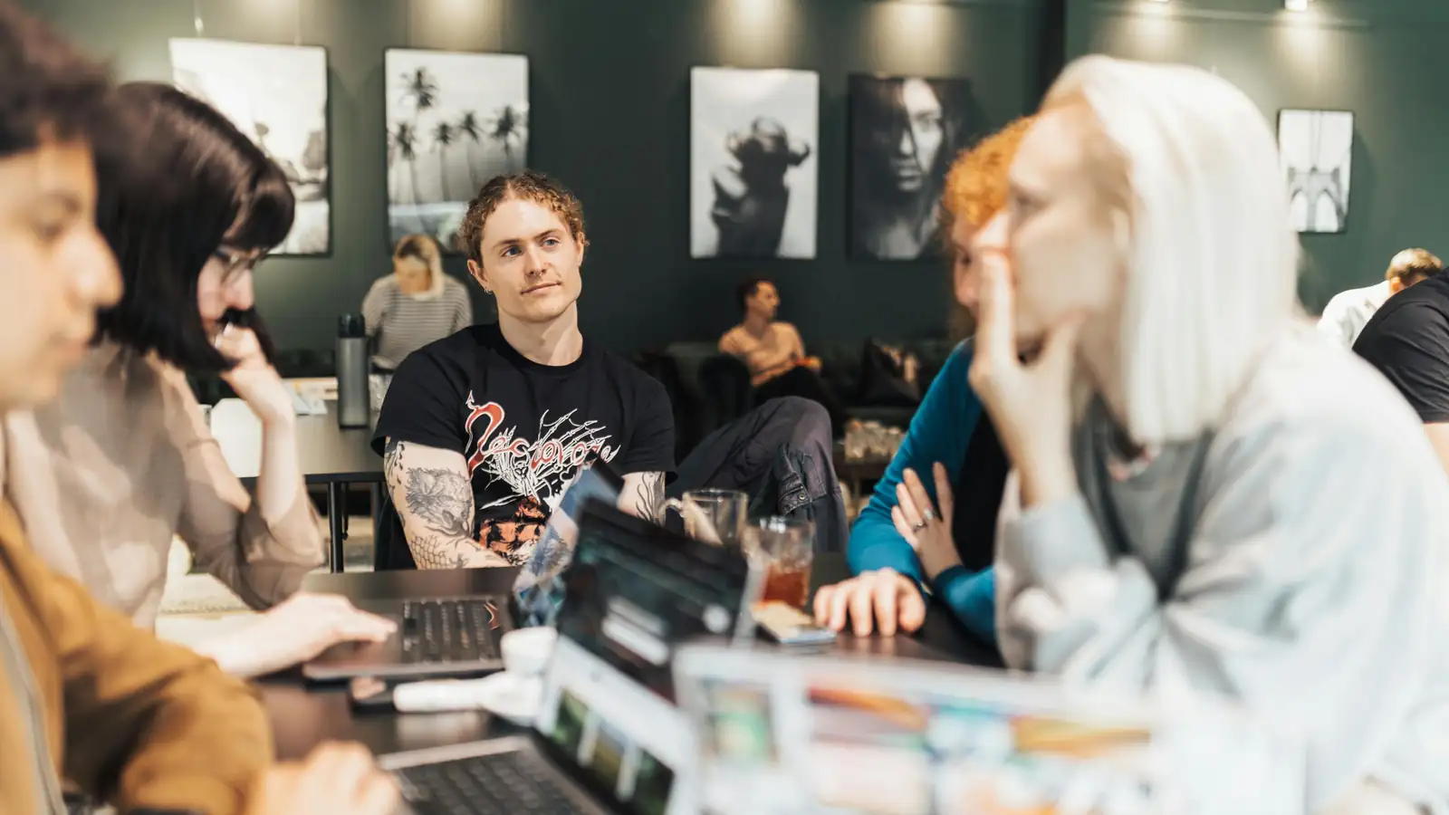 Group of young adults discussing language learning